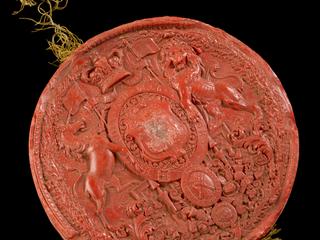 Royal wax seal for Usher's steam plough model