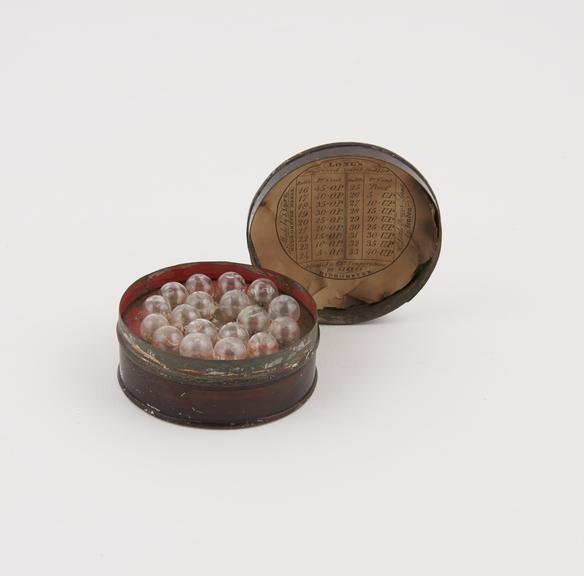 Round japanned box containing 18 spirit bubbles, by Joseph Long