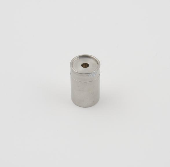 part of  machined cylindrical container with machined hole