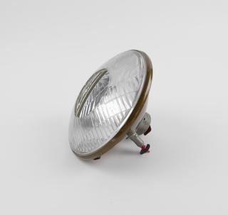 Lucas type 700 headlamp,  with Mazda twin filament pre-focus bulb and Osram 12 volt 6 watt bulb