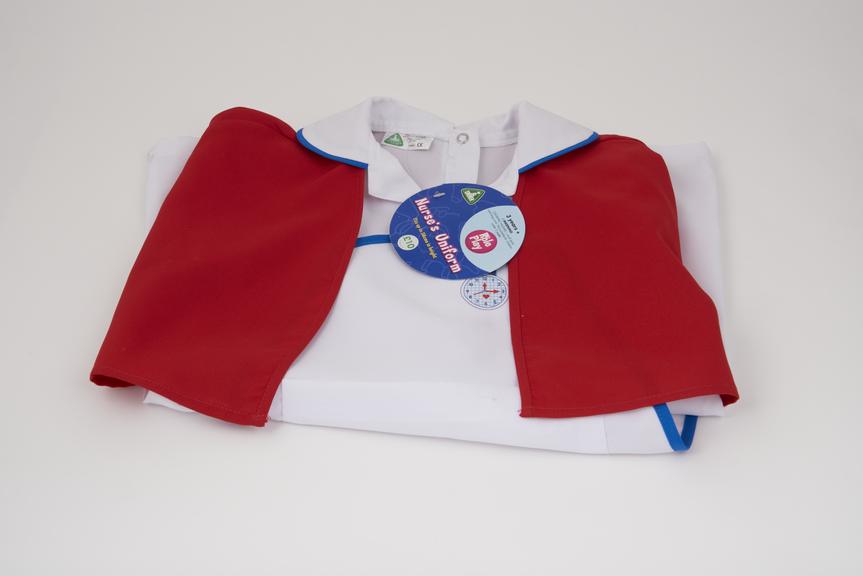 Child dressing up nurse's uniform