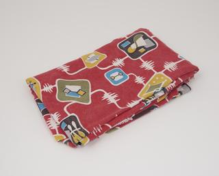 One of a pair of kitchen curtains