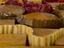 Biscuit Packers' test comprising tray holding four wooden "biscuit" shapes and three thin strips of corrugated cardboard to "wrap" them with