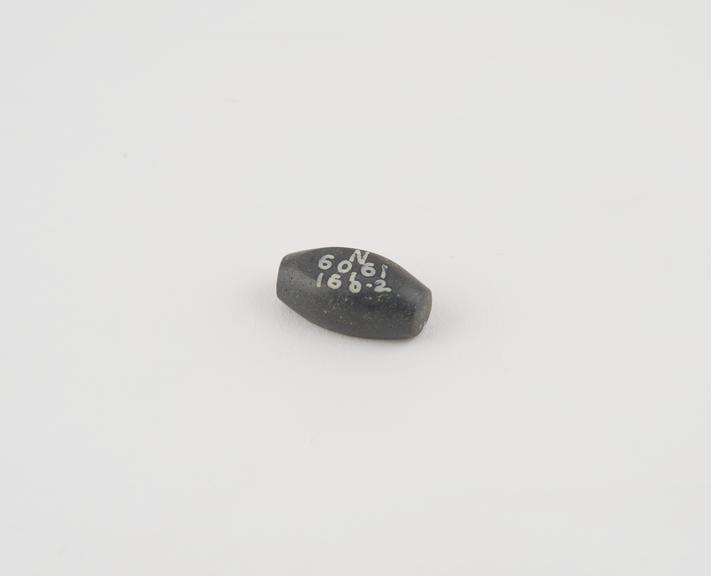 One of 5 haematite Syrian weights, barrel shaped, from Gaza