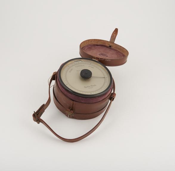 Paulin aneroid barometer by Paulin, 1923, with leather case.