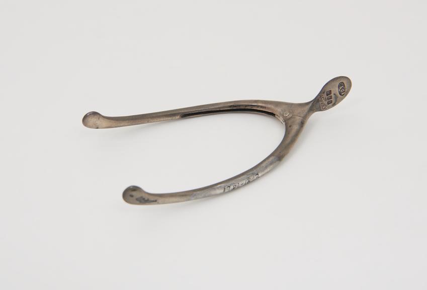 One pair of sugar-tongs, in the form of a wishbone