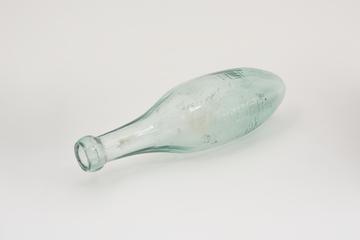 Glass soda water bottle, London, 1880-1920