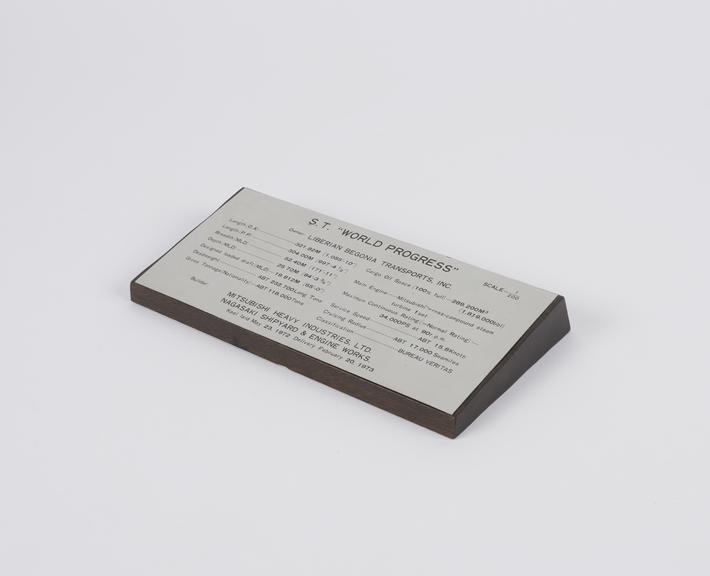 Plaque for the V L C C Model World Progress''