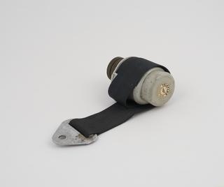 Reel type seat belt anchorage with seat belt for motor vehicles attached