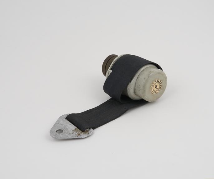 Reel type seat belt anchorage with seat belt for motor vehicles