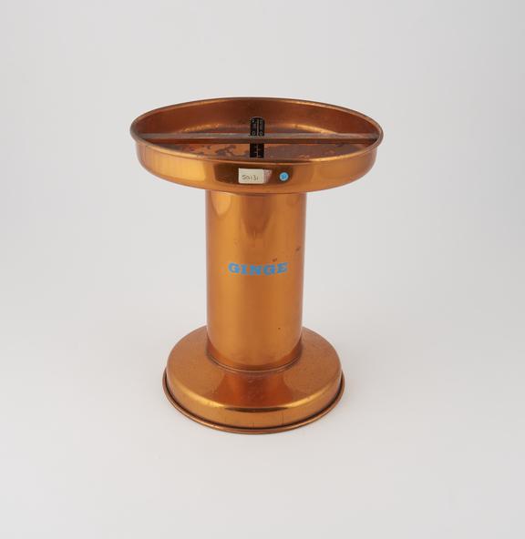 Copper rain gauge, by Ginge, with indicator float.