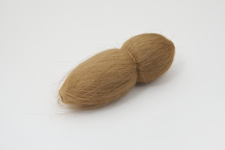 Specimen of fine hand-spun flax yarn.