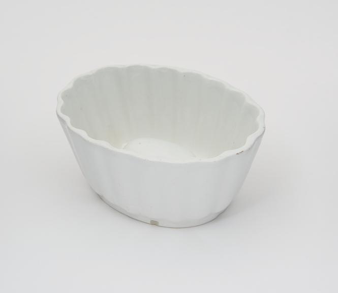 White glazed earthenware jelly mould