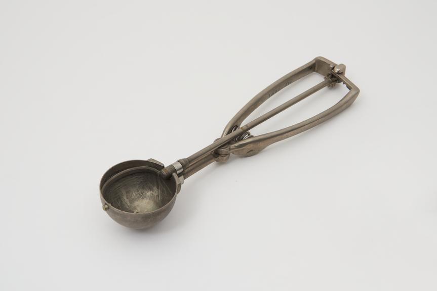 'Bonzer' ice cream scoop, spring and rachet operated, c1930.