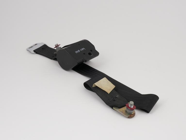 Essem reel seat belt anchorage for motor vehicles