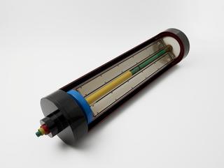 Sectioned model showing aspects of the gas centrifuge to enrich uranium hexafluoride, 1982.