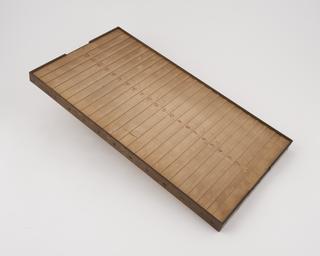 Wooden stand with red numbers 1-22 along the centre