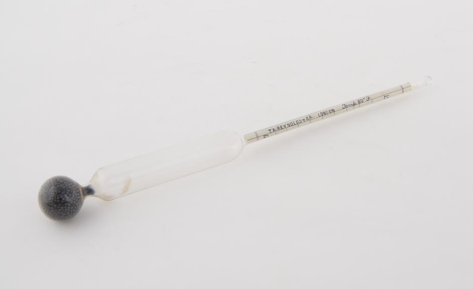 Glass hydrometer by T A Reynolds and Co., London