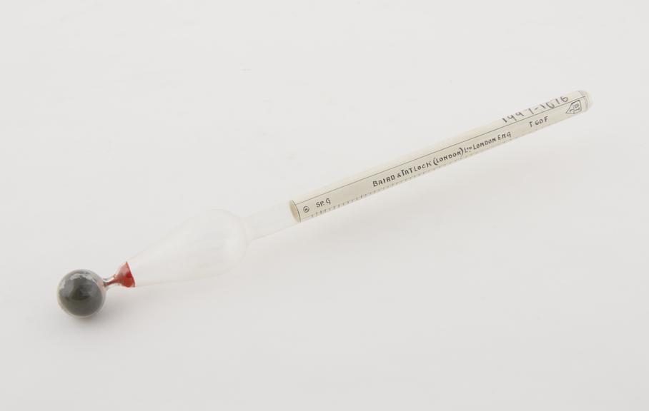 Glass specific gravity hydrometer marked Baird & Tatlock