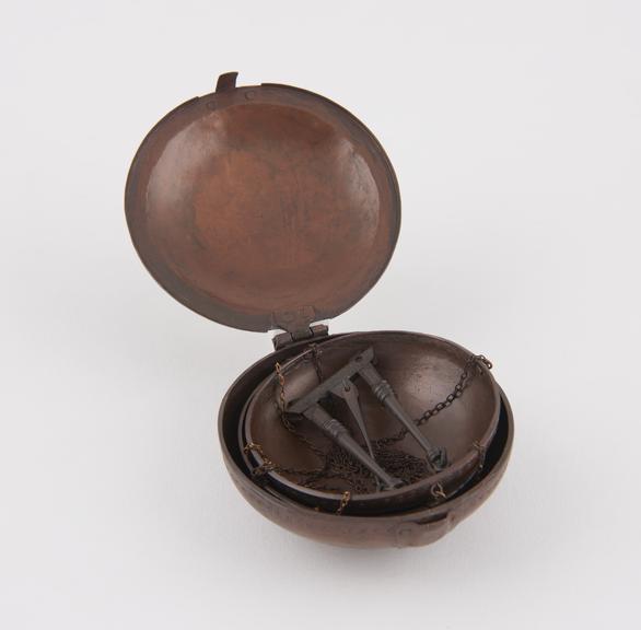 Replica of Norse folding bronze balance, with bronze case