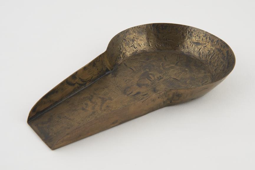 One of two large bronze scoops for Ashanti gold-takers scales