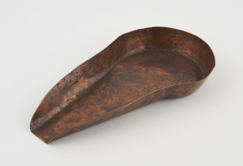 One of two large bronze scoops for Ashanti gold-takers scales