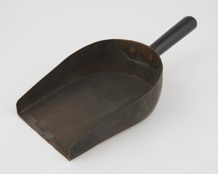 Copper coin shovel with ebony handle