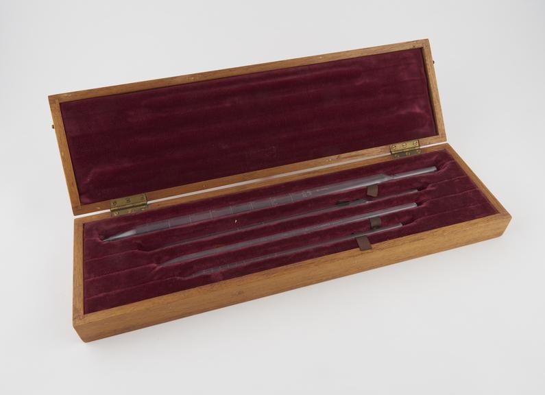 One of five sets of standard pipettes in fitted wooden case, c