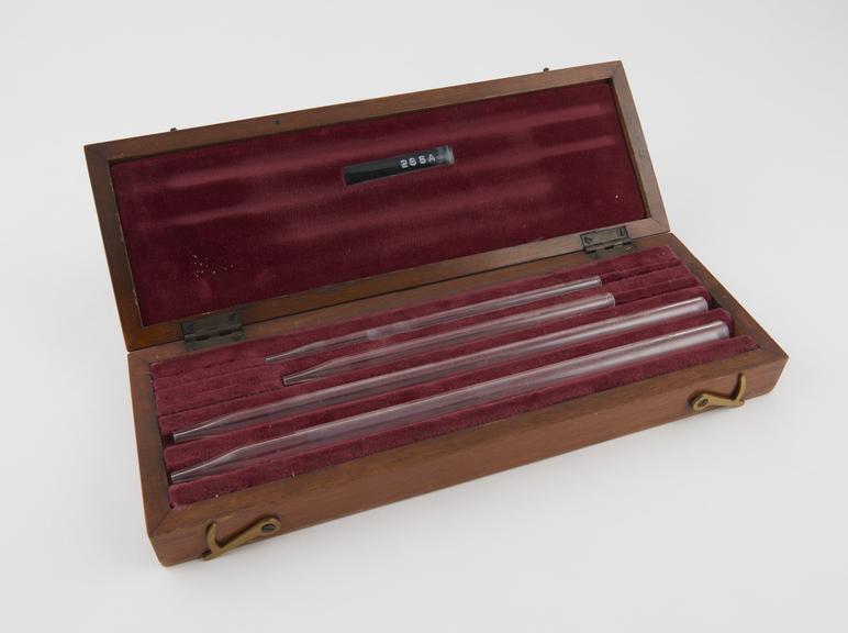 One of five sets of standard pipettes in fitted mahogany case