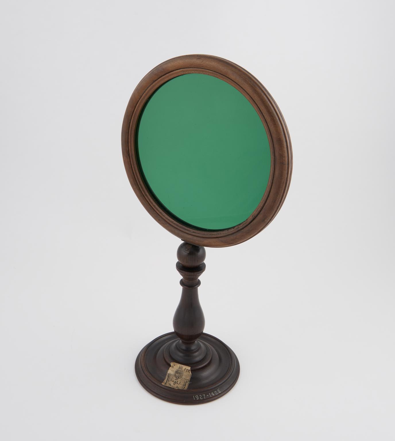 Green glass disc, 1725-1750.