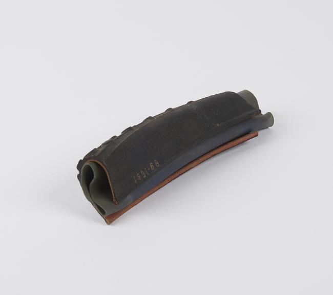 Section of Dunlop cycle tyre cover, with air tube, 1.75 Magnum'