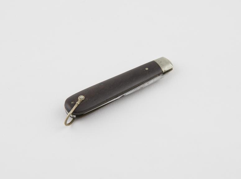A penknife with the blade modified to measure the thickness of