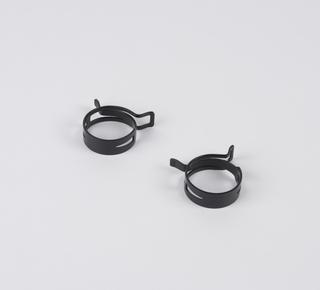 Two flat steel spring clips