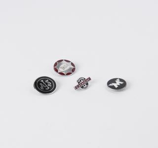 Four metal motorcycle brand pin badges