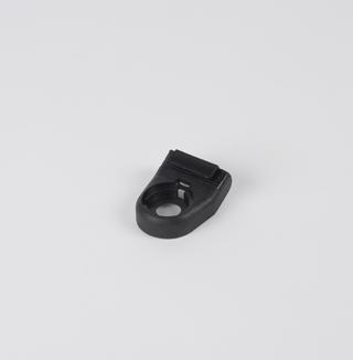 Black plastic seat belt fitting