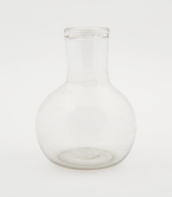 One of three glass spirit bottles, 18th century