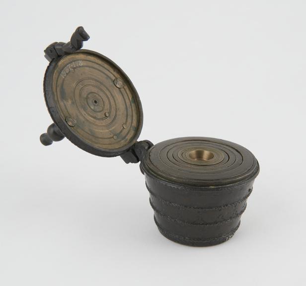 Set of Spanish bronze cup weights in hinged case, 17th century