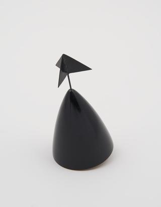 Black starboard-hand buoy with black triangular topmark