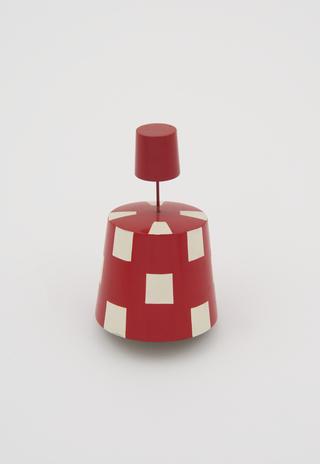 Red and white chequered port-hand buoy with red can topmark