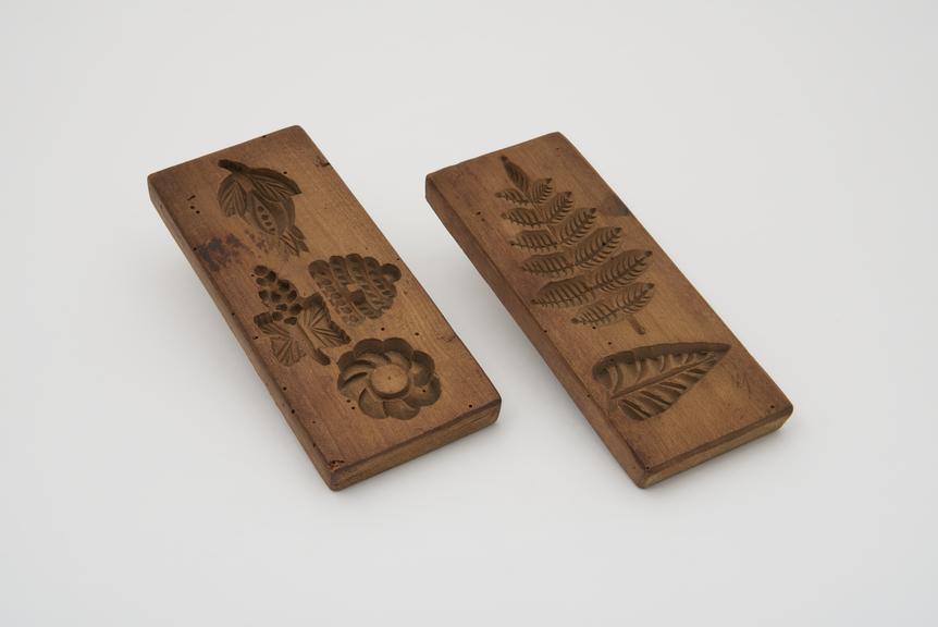 2 wooden butter moulds