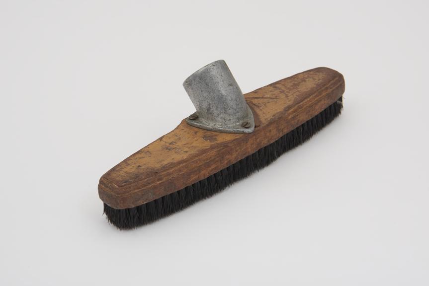 Hard surface brush for a cannister-type vacuum cleaner