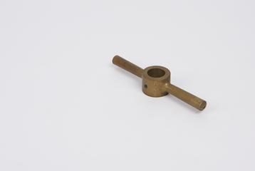 Brass ring with two handles, from screw-propeller models