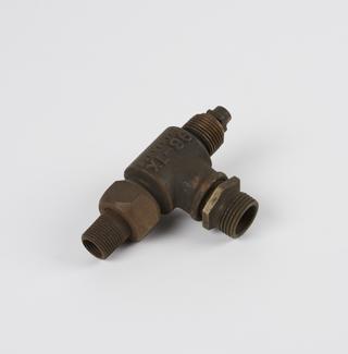 "T" shaped connector component from Locomobile Steam Car