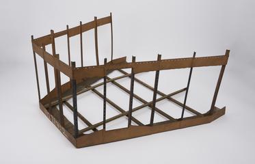 Curved section of model of portion of the stern of a cargo vessel