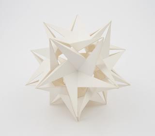 Polyhedron model showing the icosahedron and one of its 58 stellations