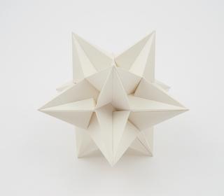 Polyhedron model showing the icosahedron and one of its 58 stellations