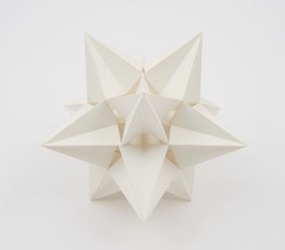 Polyhedron model showing the icosahedron and one of its 58 stellations