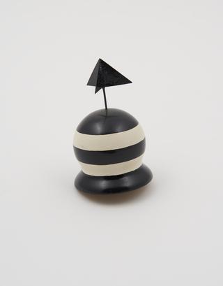 Black and white striped middle-ground buoy with black triangular topmark