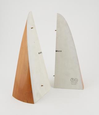 two parts of a wooden disected cone