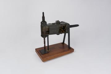 Sectioned 'Close Quarter Drill', on mahogany stand